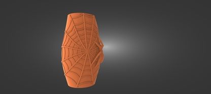 An orange, spider-like object with a web-like pattern on it, standing alone against a dark background.