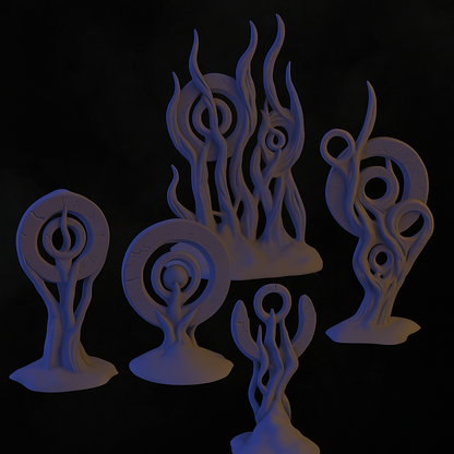 a group of white sculptures sitting on top of a table