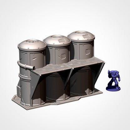 A 3D rendering of a metallic structure with three cylindrical tanks, and a small figurine of a person standing next to it.
