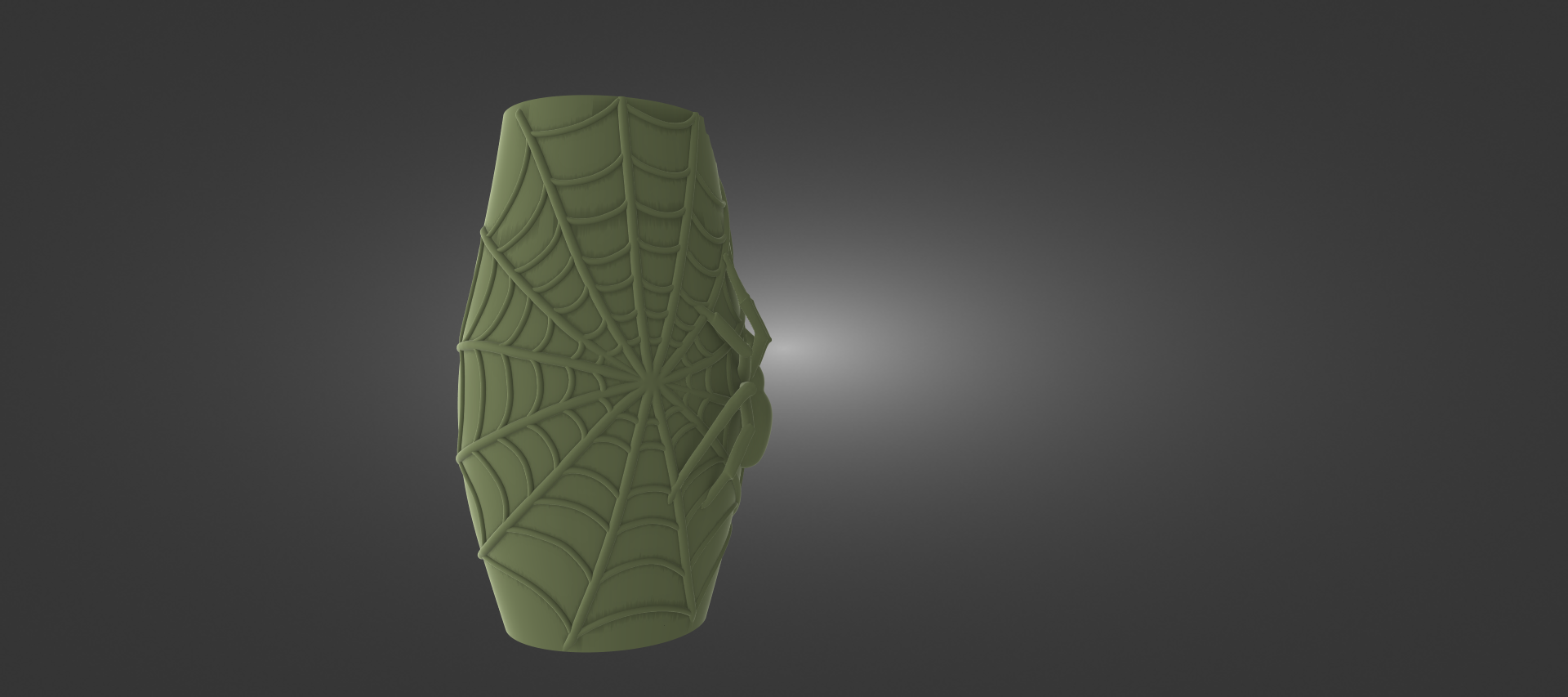 A green, spider-like object with a web-like pattern on it, set against a dark background.