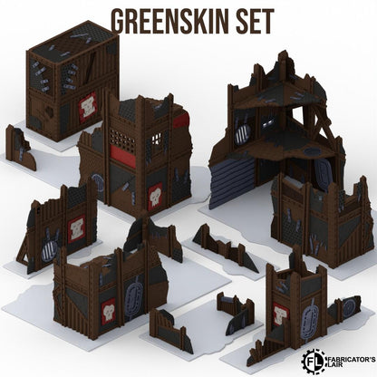 a collection of various damaged and destroyed structures, including buildings and towers, which appear to be part of a Greenskin set.