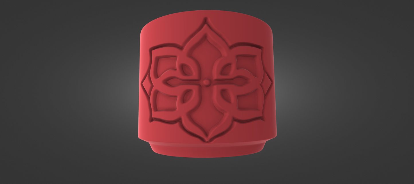 A red, 3D-rendered object with an intricate, symmetrical design on its surface.