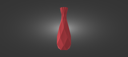 A red, geometric vase stands alone against a dark background.