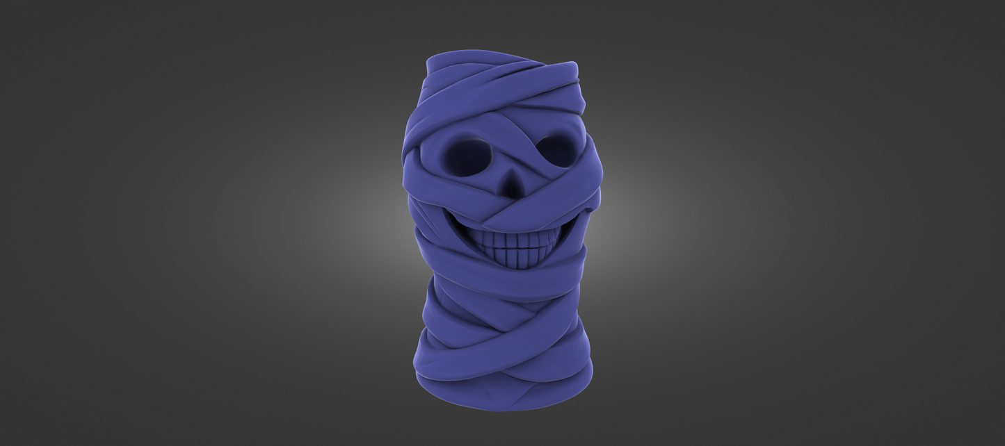 A purple, twisted, and wrapped object resembling a skull or a mummified figure, with a smiling expression.
