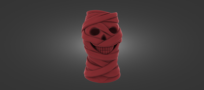 A red, twisted, and coiled object resembling a skull or a similar shape, with a smiling expression.