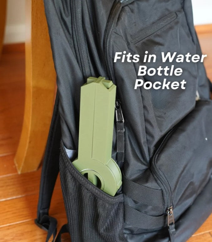 A black backpack with a green bottle pocket attached, and the text "Fits in Water Bottle Pocket" printed on the backpack.