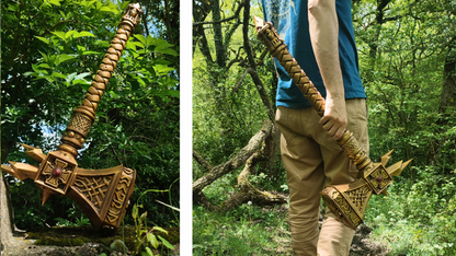 a person holding a large, ornate golden weapon, possibly an axe or spear, in a forest setting.