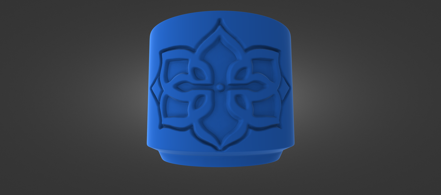 A blue, cylindrical object with an intricate, symmetrical design on its surface.