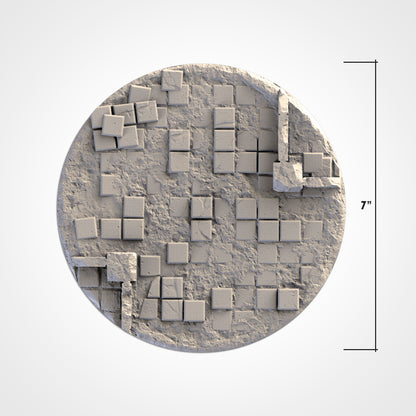 A 3D rendering of a circular object composed of numerous small square tiles arranged in a grid-like pattern.