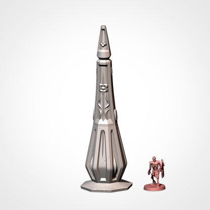 A large metallic object resembling a tall, pointed structure with a pointed top, and a smaller, metallic figurine of a person standing next to it.