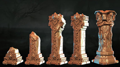 A collection of five ornate, golden-colored stone pillars or statues, each with intricate designs and patterns, arranged in a row against a dark background.