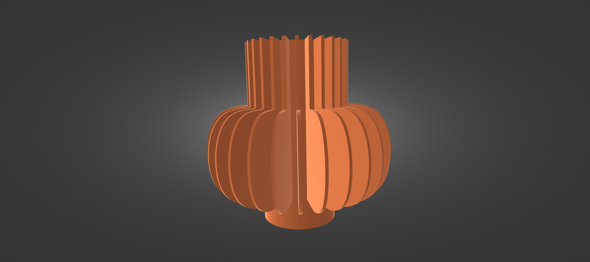 An orange, cylindrical object with a textured, ribbed surface, resembling a vase or container, is the central focus of the image.