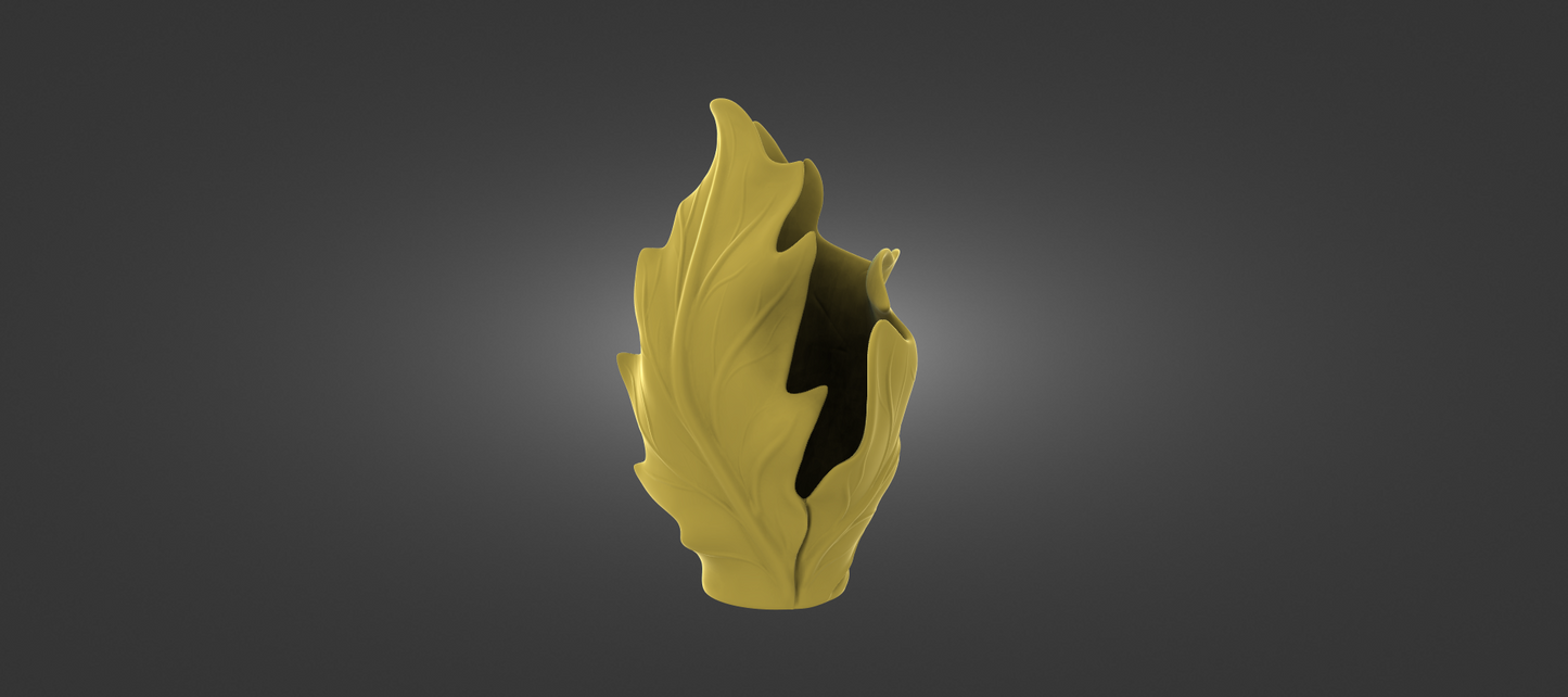 A golden, leaf-like vase or sculpture stands alone against a dark background.