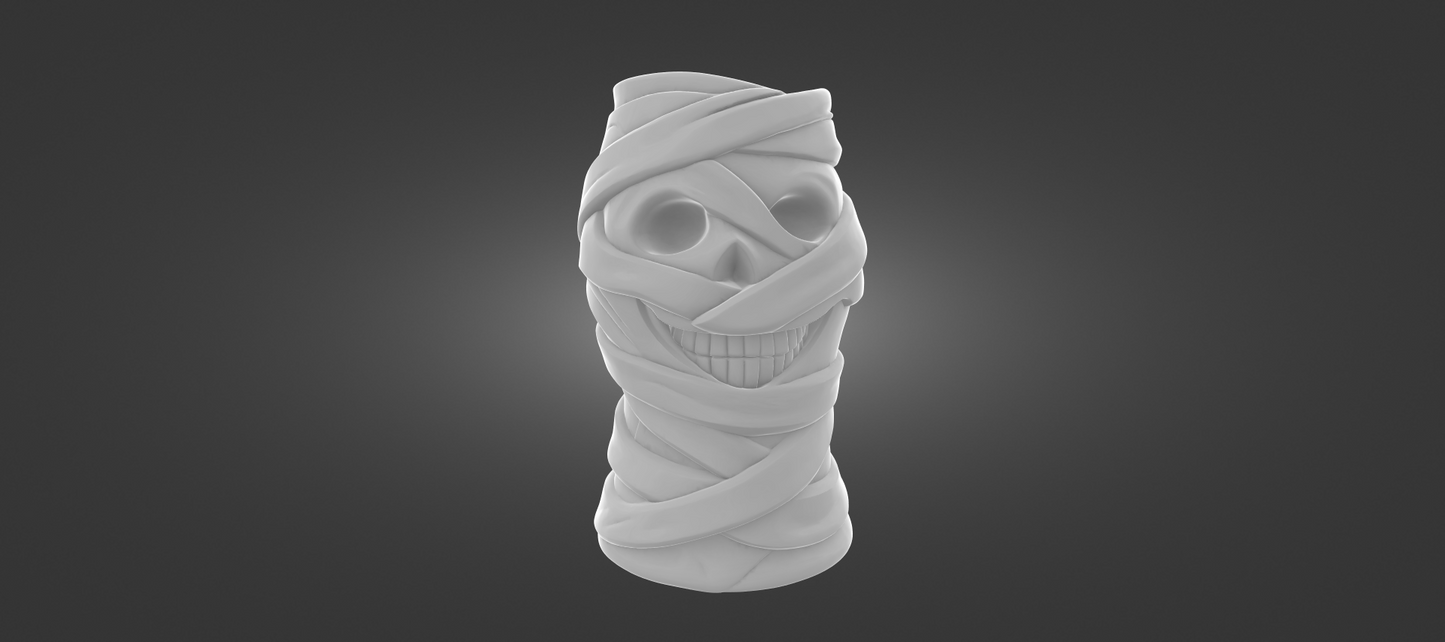 A 3D rendering of a skull wrapped in bandages, with a smiling expression, against a dark background.