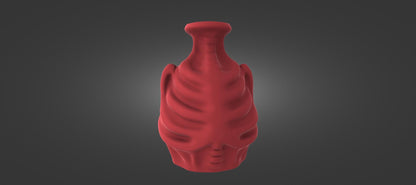 A red, sculpted vase or container with a unique, abstract design.